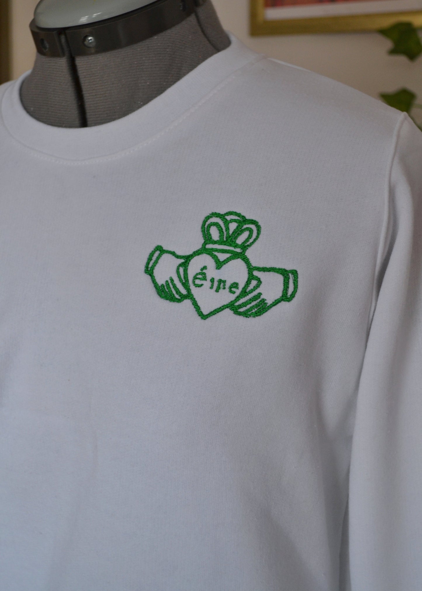 White Claddagh Sweatshirt – Green Embroidery